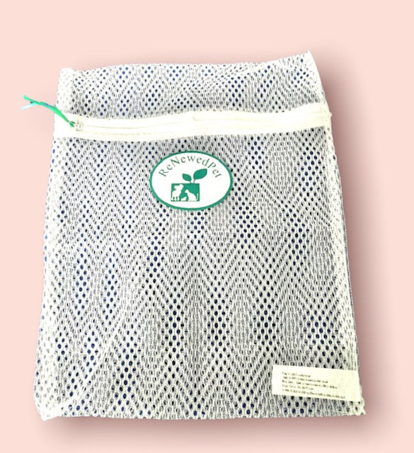 White mesh pouch with ReNewedPet logo for reusable cotton pet cleaning pads