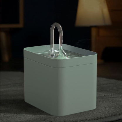 Automatic cat water fountain with clear spout and transparent water basin on base