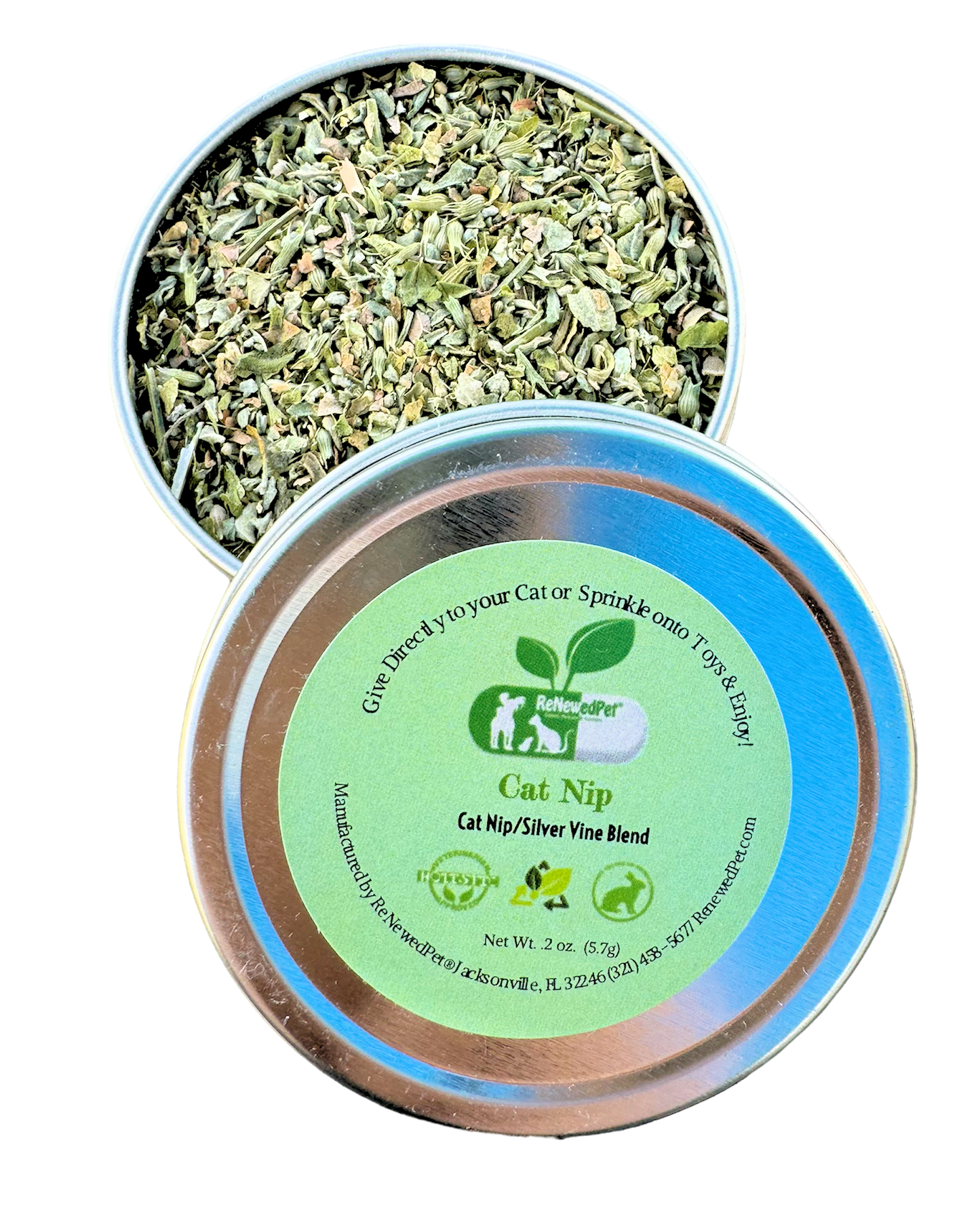 Cat nip and silver vine blend tin with loose green herb leaves, lid label visible