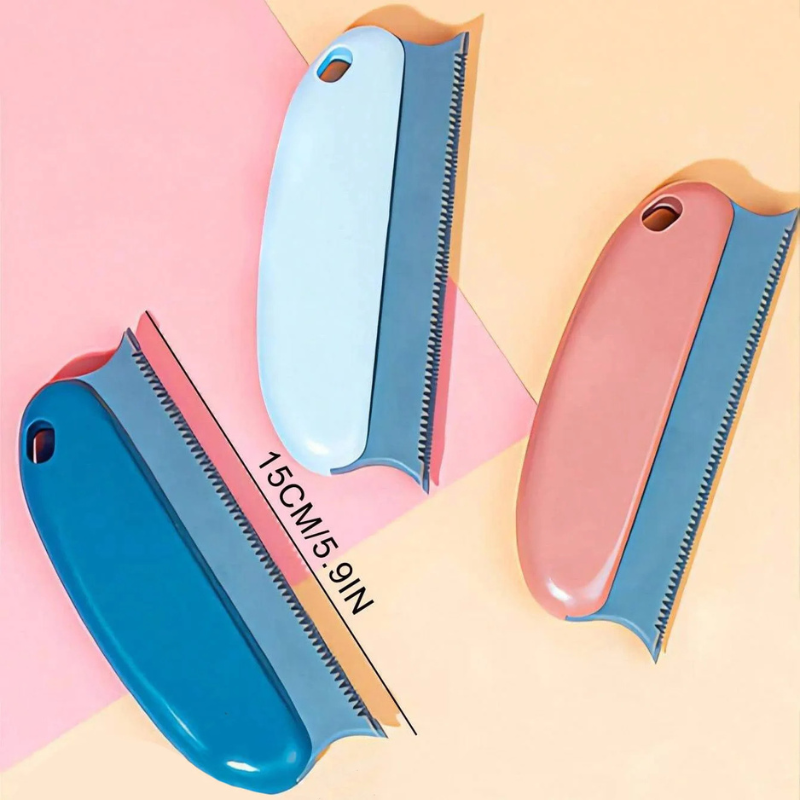 Pet hair remover brushes, blue and red handles with black ridged teeth