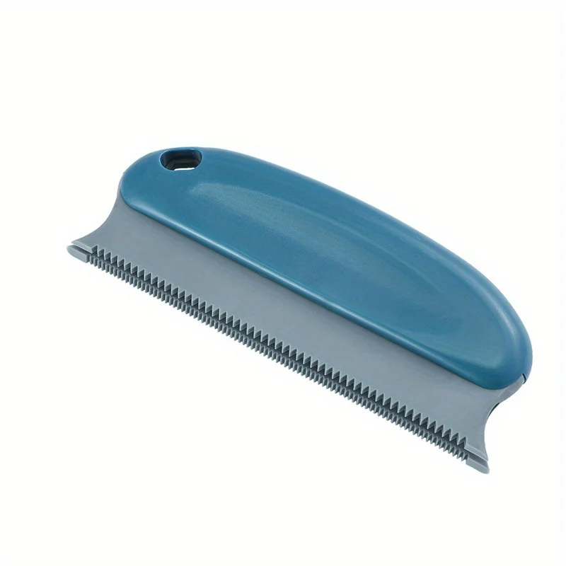 Light blue pet hair remover brush with long gray ridged teeth