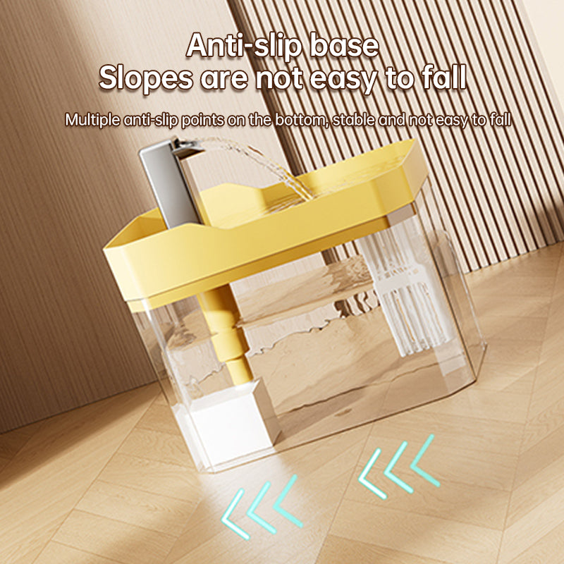 Transparent cat water fountain with yellow tray and anti-slip base, angled view