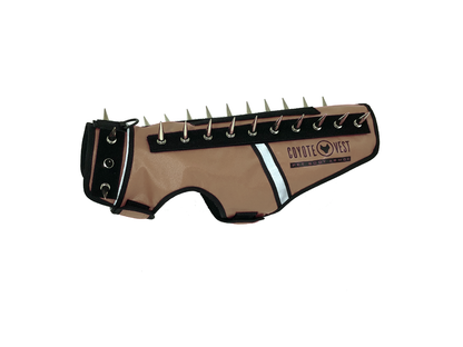 Beige spike-studded cat vest with black trim and metal studs along top edge