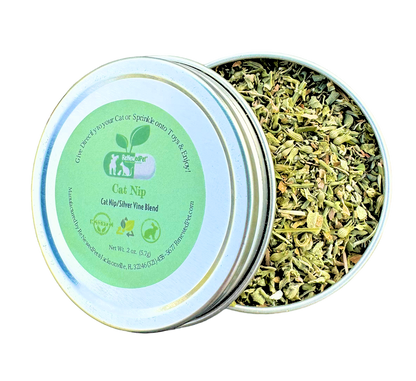 Cat nip and silver vine blend tin with two open lids and green herb leaves