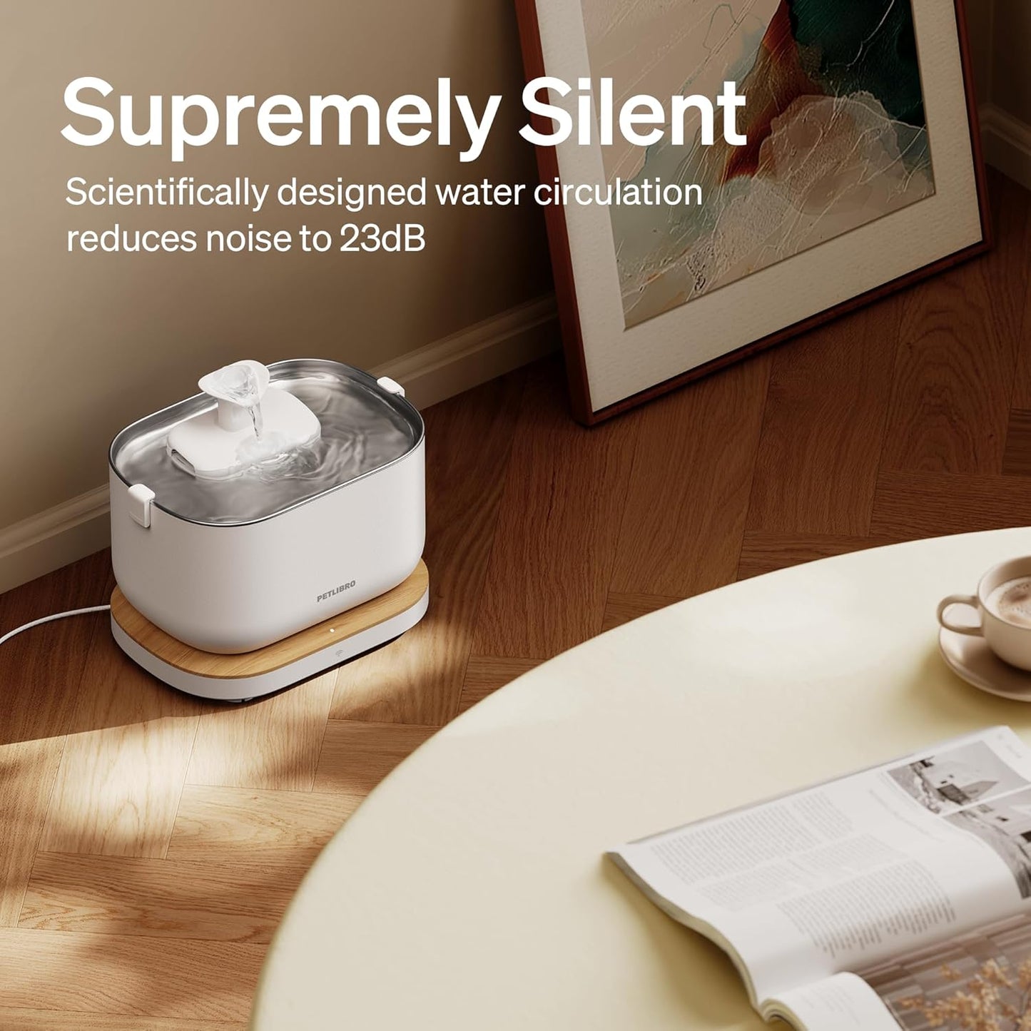 White cat water fountain with circulating water top, on wooden floor near furniture