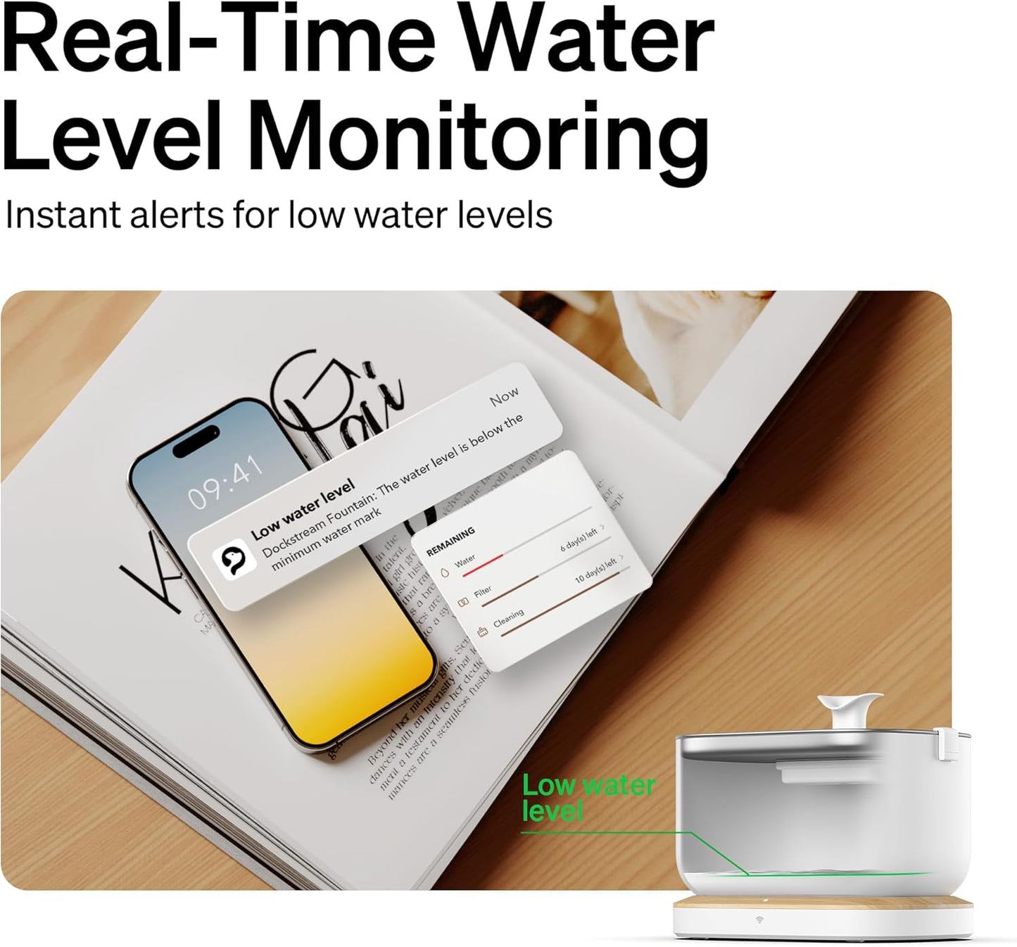 White cat water fountain next to phone showing real-time low water level alert