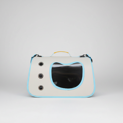 Light blue and white pet carrier backpack with large oval bubble window and black clips.