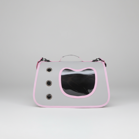 Pink and white pet carrier backpack with large oval bubble window and side handle.