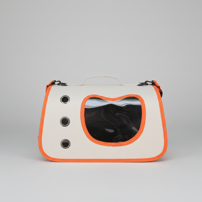 Orange and white pet carrier backpack with round bubble window and adjustable straps.