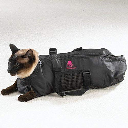 Black grooming bag with mesh panel and side pocket, worn on small dog