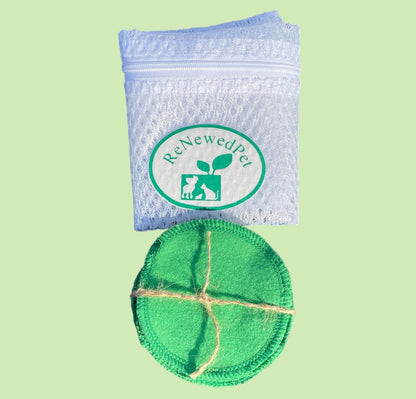 Green cotton pet cleaning pads with blue wipes bag and circular ReNewedPet logo