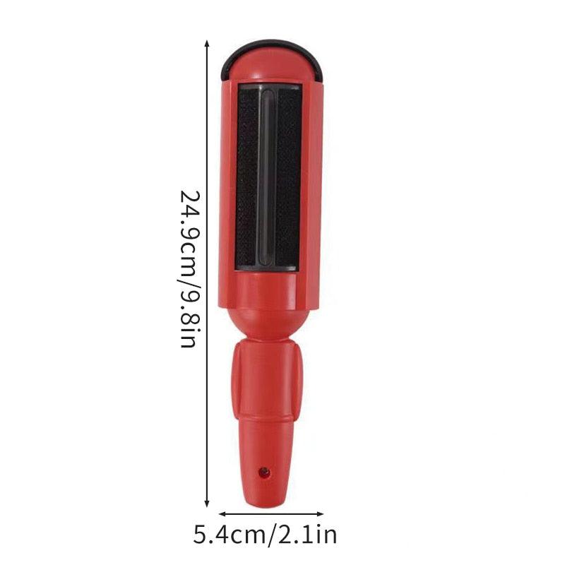 Red self-cleaning base for pet hair remover with black brush insert and handle