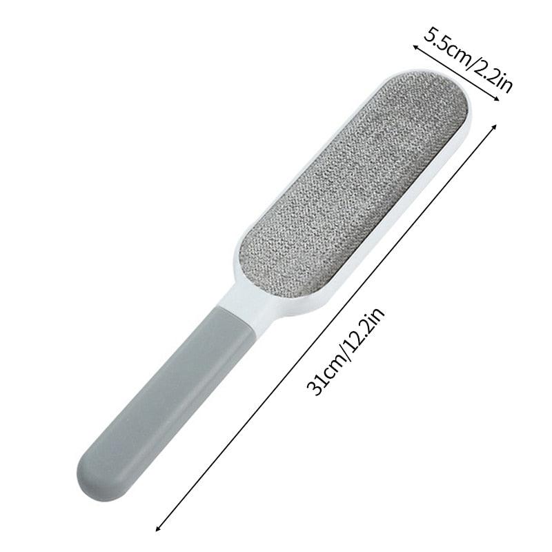 Gray pet hair remover lint brush with white head and long handle
