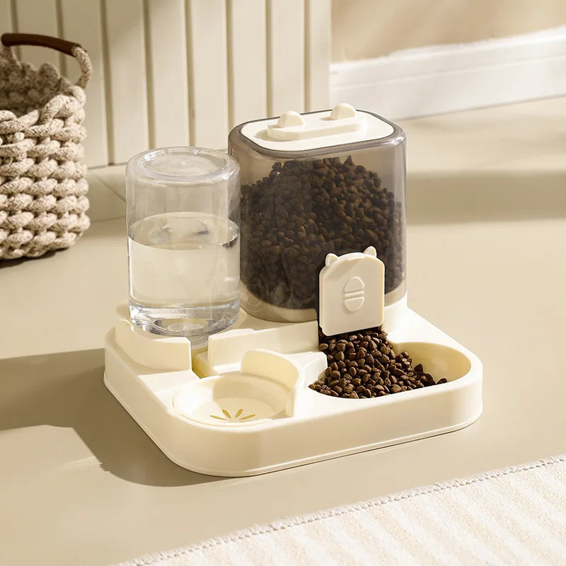 Automatic pet feeder with water fountain, cream base, clear water bottle and food compartment